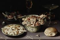 Three Dishes of Sweetmeats and Chestnuts with Three Glasses on a Table - Osias Beert